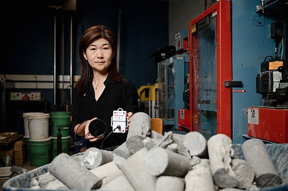professor Luna Lu holding rebel sensors