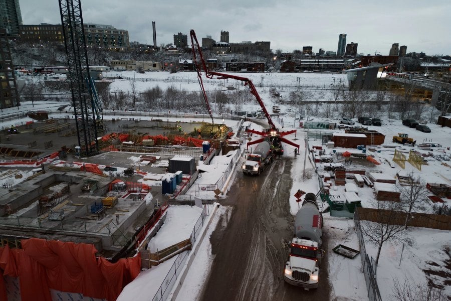 construction site pouring concrete in winter